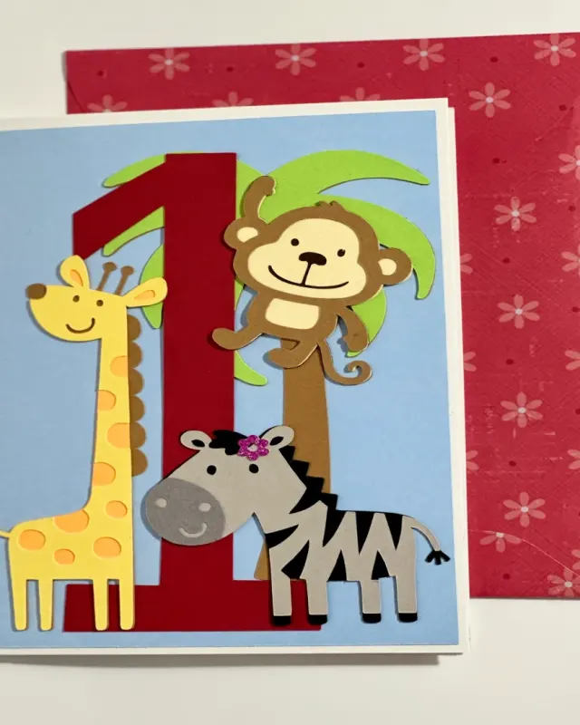 handmade birthday card to celebrate 1 year with layered zoo animals