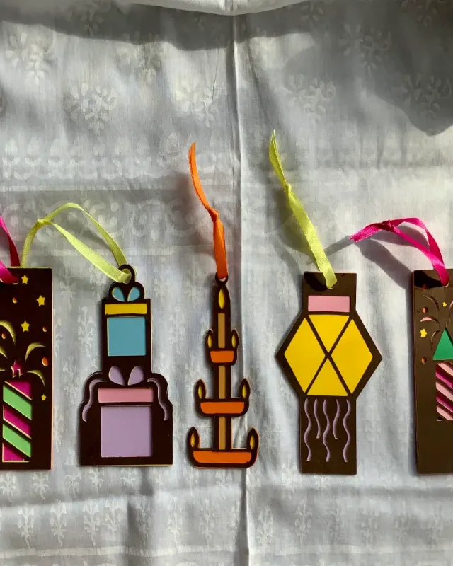 handmade gift tags with intricately cut and layered