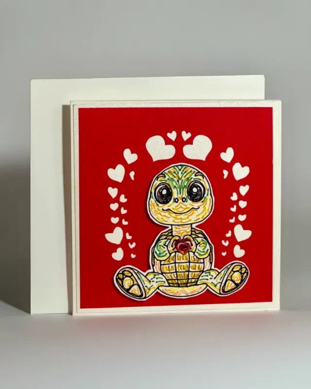 handmade valentines day card with heart elements, turtle drawn and coloured