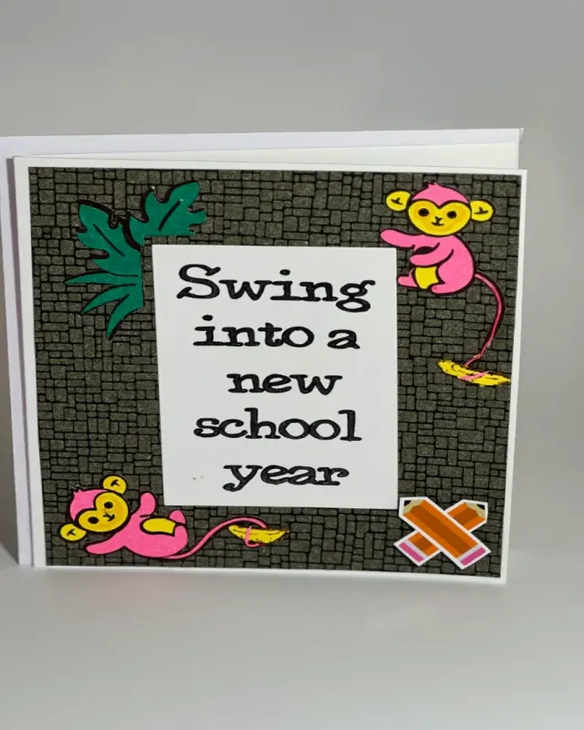 handmade backtoschool card with intricate cuts and layers