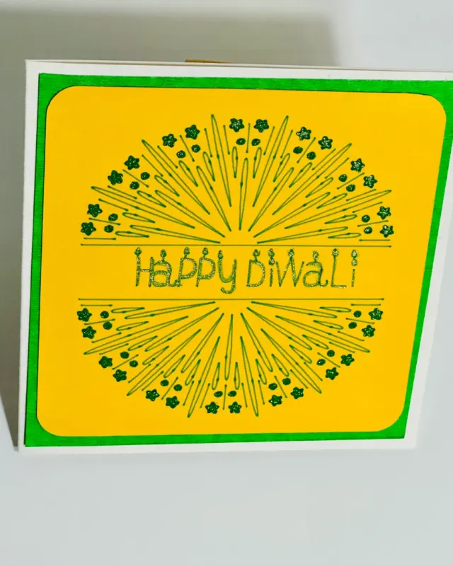 handmade diwali card drawn with glittering sparklers and sentiment